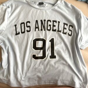 •Los Ángeles light blue crop top
•Size-Xl
•Super breathable